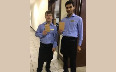 Vincent and Nazeer as Waiters at the Hilton
